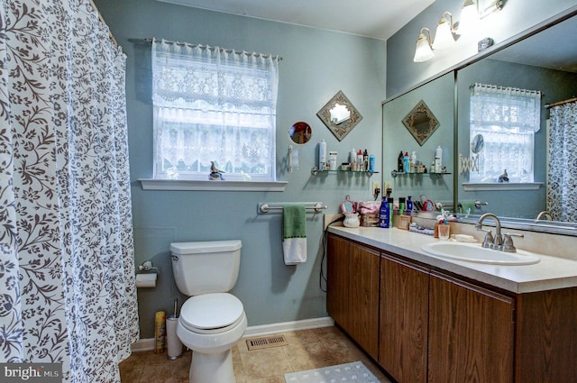 56 Zachary Dr, Chalfont, PA 18914 - bathroom with healthy amount of natural light, toilet, vanity, and baseboards