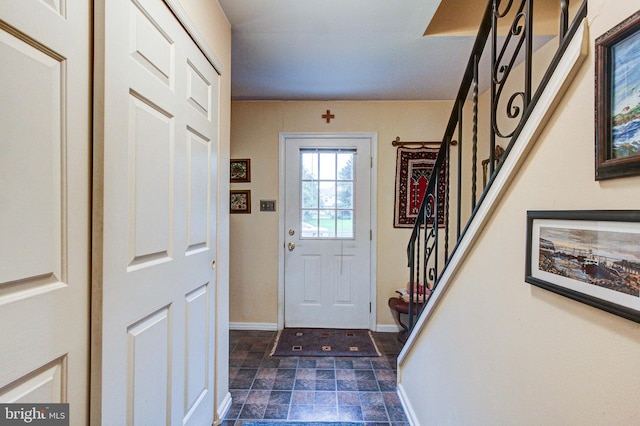 56 Zachary Dr, Chalfont, PA 18914 - entryway featuring stairway, stone finish flooring, and baseboards