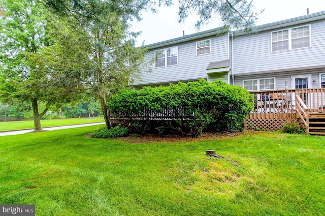 56 Zachary Dr, Chalfont, PA 18914 - back of property featuring a wooden deck and a lawn