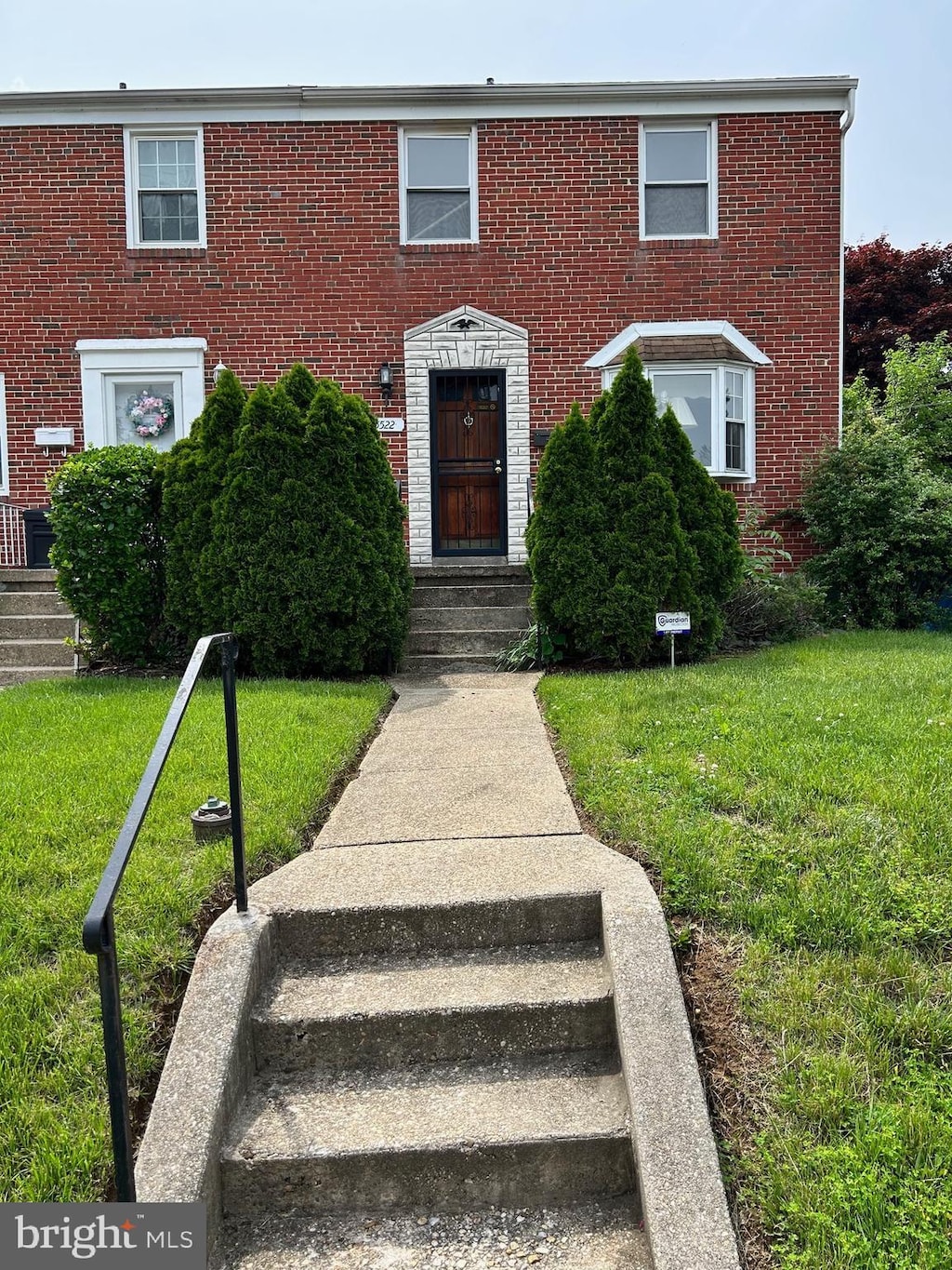5522 Todd Ave, Baltimore, MD 21206 - view of front of home with brick siding and a front yard
