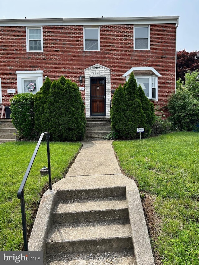 5522 Todd Ave, Baltimore, MD 21206 - view of front of home with brick siding and a front yard