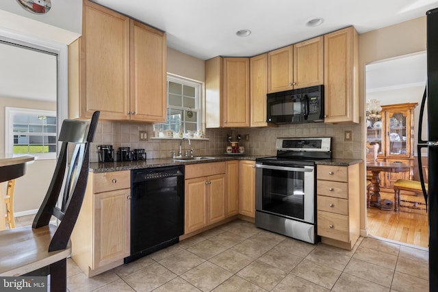 1908 Sterigere St, Eagleville, PA 19403 - kitchen featuring black appliances, a sink, backsplash, and light tile patterned floors