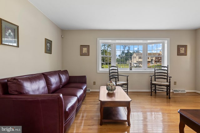 1908 Sterigere St, Eagleville, PA 19403 - living area with light wood-style flooring and baseboards