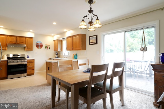 218 Independence Ave, State College, PA 16801 - dining area featuring recessed lighting, light carpet, a chandelier, and baseboards