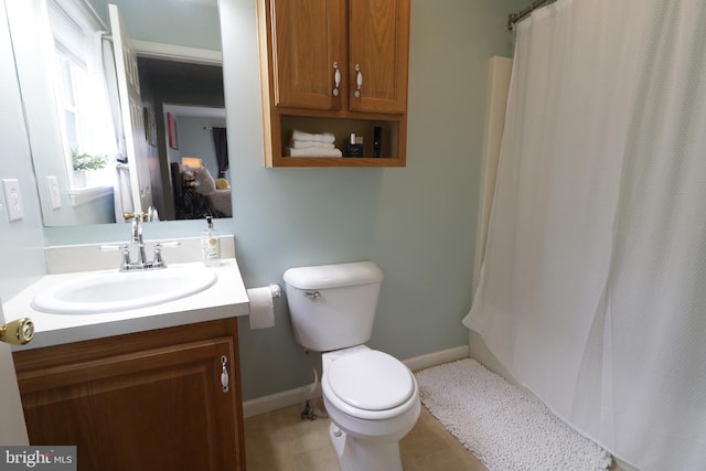 218 Independence Ave, State College, PA 16801 - full bath featuring vanity, toilet, a shower with shower curtain, baseboards, and tile patterned floors