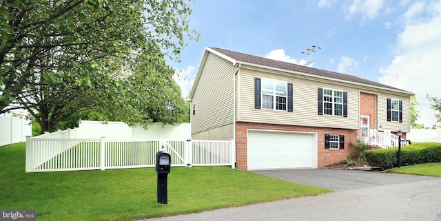 218 Independence Ave, State College, PA 16801 - view of front of home featuring brick siding, driveway, and an attached garage