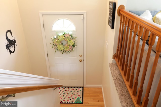218 Independence Ave, State College, PA 16801 - foyer entrance featuring wood finished floors, stairs, and baseboards