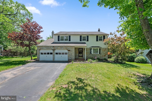 1957 Rampart Ln, Lansdale, PA 19446 - traditional-style home featuring stone siding, asphalt driveway, a chimney, an attached garage, and a front yard