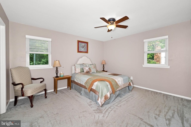 84 Winding Way, Upper Chichester, PA 19061 - bedroom with multiple windows, baseboards, and carpet floors