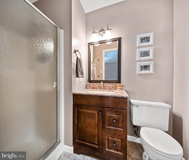 84 Winding Way, Upper Chichester, PA 19061 - full bathroom featuring baseboards, a stall shower, toilet, and vanity