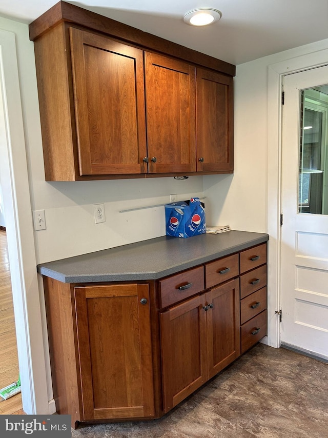 4599 Carlisle Rd, Gardners, PA 17324 - kitchen with dark countertops and brown cabinets