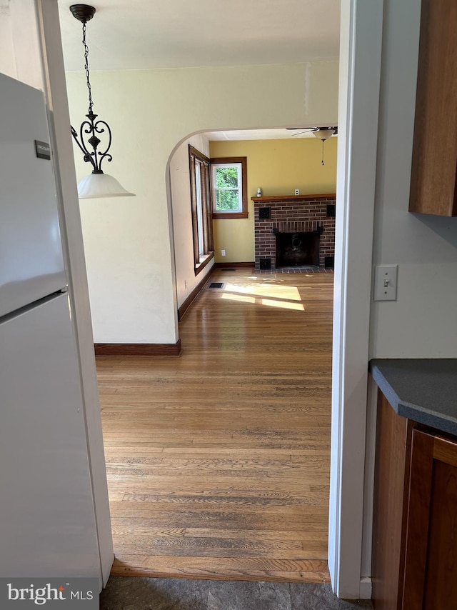 4599 Carlisle Rd, Gardners, PA 17324 - hall with wood finished floors, arched walkways, and baseboards