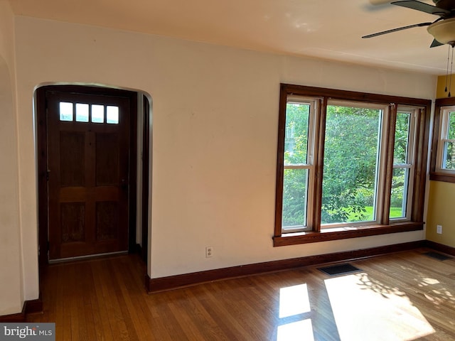 4599 Carlisle Rd, Gardners, PA 17324 - entryway with arched walkways, ceiling fan, baseboards, and wood-type flooring