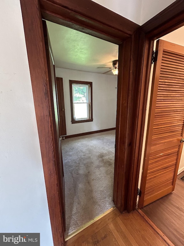 4599 Carlisle Rd, Gardners, PA 17324 - hallway featuring baseboards, wood finished floors, and carpet flooring