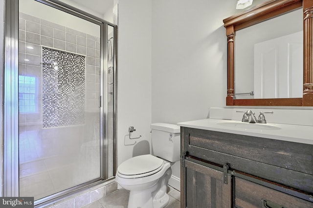 1129 Washington Blvd, Baltimore, MD 21230 - full bathroom with tile patterned floors, a stall shower, vanity, and toilet