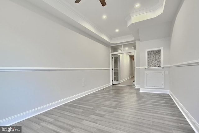 1129 Washington Blvd, Baltimore, MD 21230 - spare room featuring crown molding, wood finished floors, baseboards, recessed lighting, and a ceiling fan