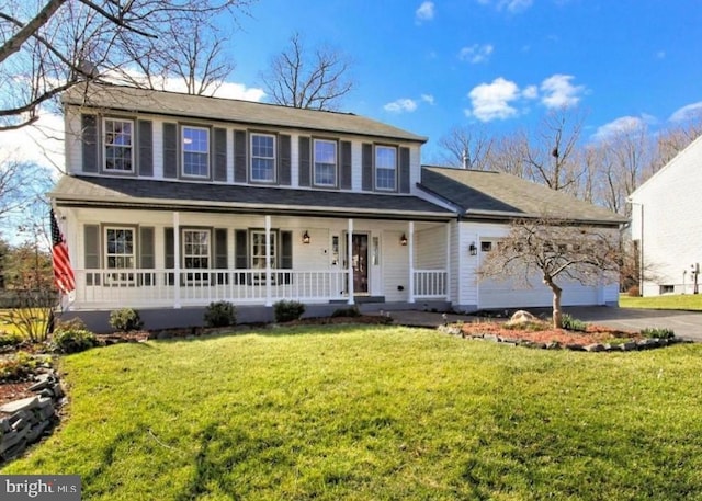 8518 Chase Glen Cir, Fairfax Station, VA 22039 - view of front of home featuring covered porch, driveway, a front lawn, and an attached garage