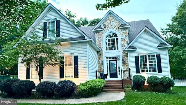 9401 Orchid Ter, Chesterfield, VA 23832 - traditional home featuring stone siding, a front lawn, and roof with shingles