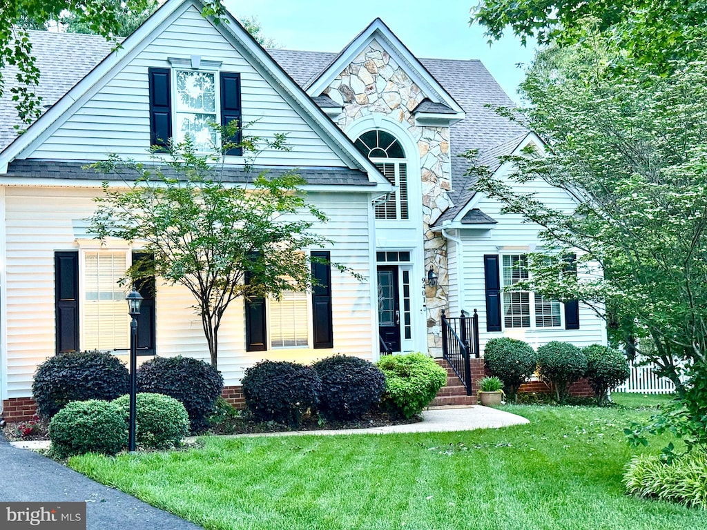 9401 Orchid Ter, Chesterfield, VA 23832 - view of front of house featuring stone siding and roof with shingles