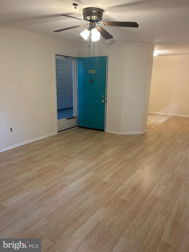 102 Stone Hurst Ct Unit 102, New Castle, DE 19720 - unfurnished room with a ceiling fan, light wood-style flooring, and baseboards