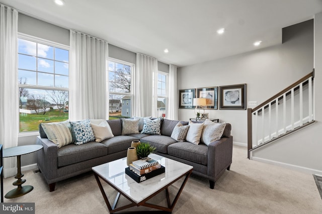87 Anthem St, Ranson, WV 25438 - living room with stairs, recessed lighting, baseboards, and light carpet