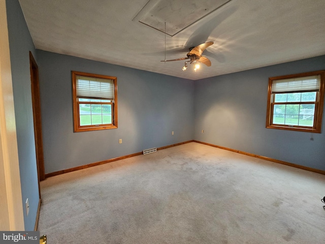 1511 Saint Francis Ln, Altoona, PA 16602 - empty room with attic access, healthy amount of natural light, carpet, and ceiling fan