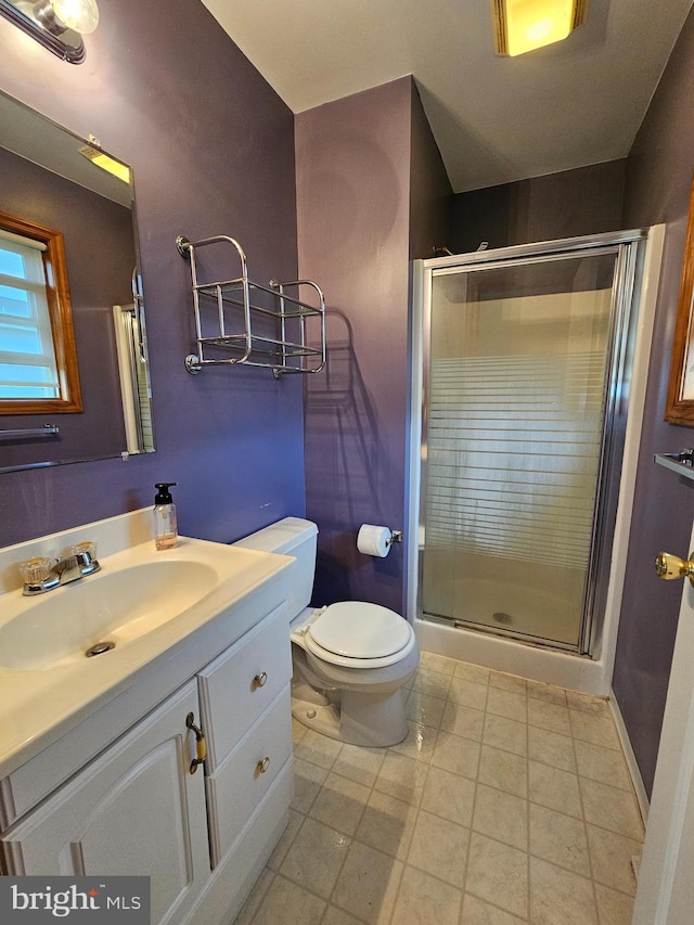 1511 Saint Francis Ln, Altoona, PA 16602 - bathroom featuring a stall shower, vanity, toilet, and tile patterned flooring