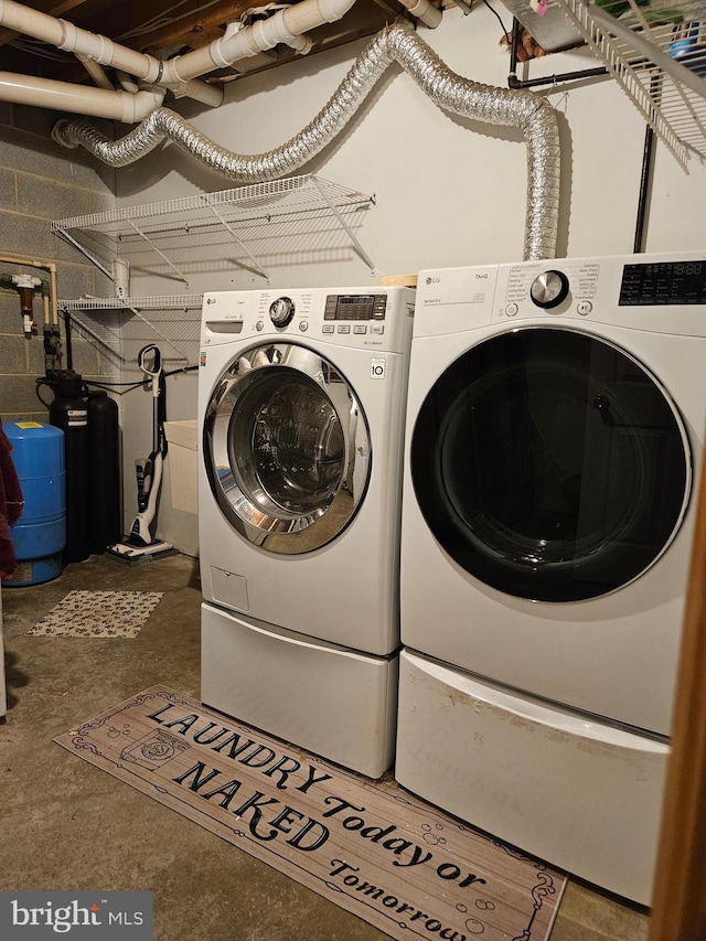 1511 Saint Francis Ln, Altoona, PA 16602 - washroom featuring washing machine and dryer and concrete block wall