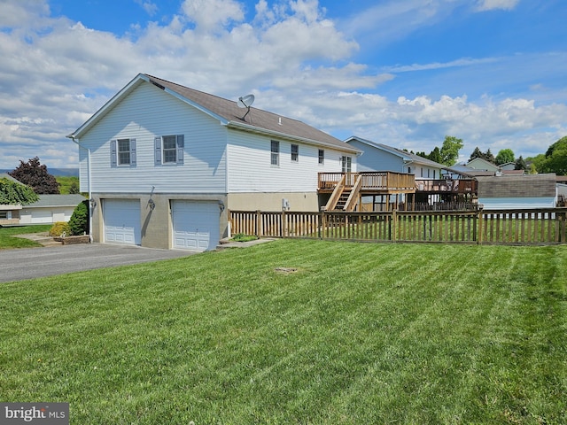 1511 Saint Francis Ln, Altoona, PA 16602 - rear view of property featuring a wooden deck, an attached garage, asphalt driveway, and stairs