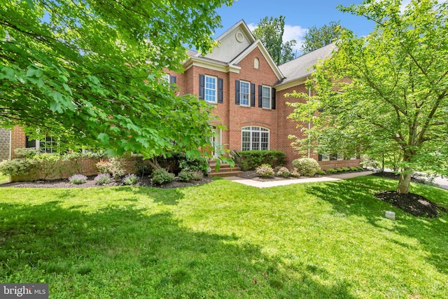 8220 Waterside Ct, Fort Washington, MD 20744 - colonial-style house with brick siding and a front yard