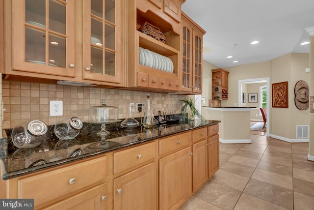 8220 Waterside Ct, Fort Washington, MD 20744 - kitchen featuring decorative backsplash, light tile patterned floors, baseboards, open shelves, and dark stone countertops