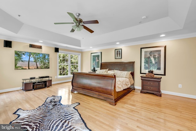 8220 Waterside Ct, Fort Washington, MD 20744 - bedroom featuring a tray ceiling, light wood finished floors, baseboards, recessed lighting, and ornamental molding