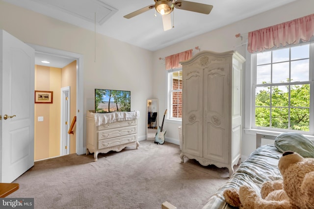 8220 Waterside Ct, Fort Washington, MD 20744 - carpeted bedroom featuring attic access, multiple windows, and a ceiling fan