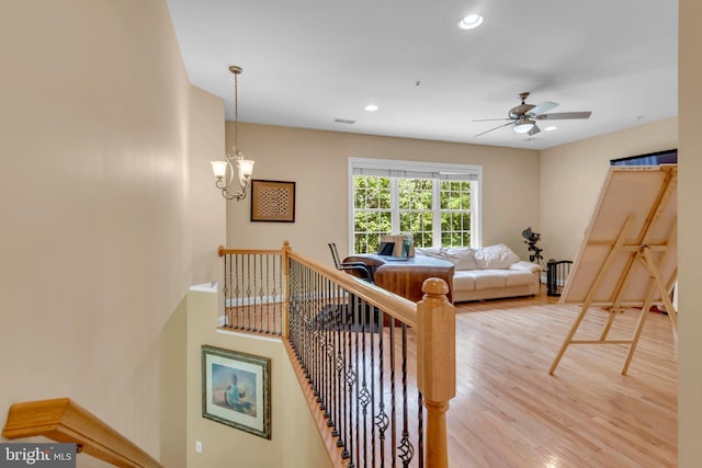 8220 Waterside Ct, Fort Washington, MD 20744 - living area with light wood-style flooring, ceiling fan, recessed lighting, baseboards, and a chandelier