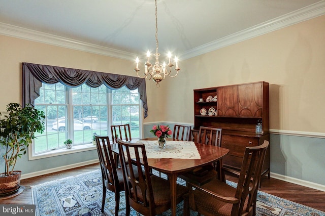 235 Amherst Dr, Doylestown, PA 18901 - dining area featuring a chandelier, crown molding, plenty of natural light, baseboards, and wood finished floors