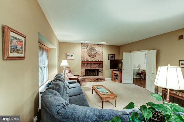 235 Amherst Dr, Doylestown, PA 18901 - carpeted living room featuring a fireplace