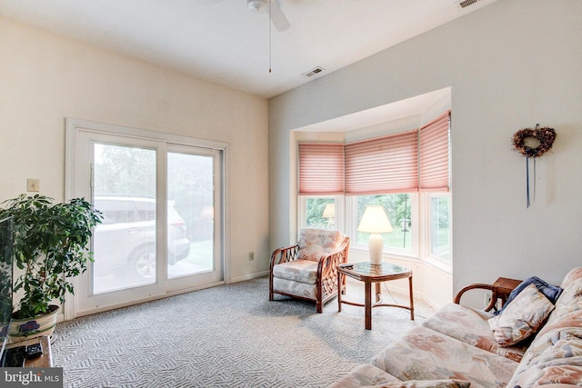 235 Amherst Dr, Doylestown, PA 18901 - carpeted living room with plenty of natural light, a ceiling fan, and baseboards