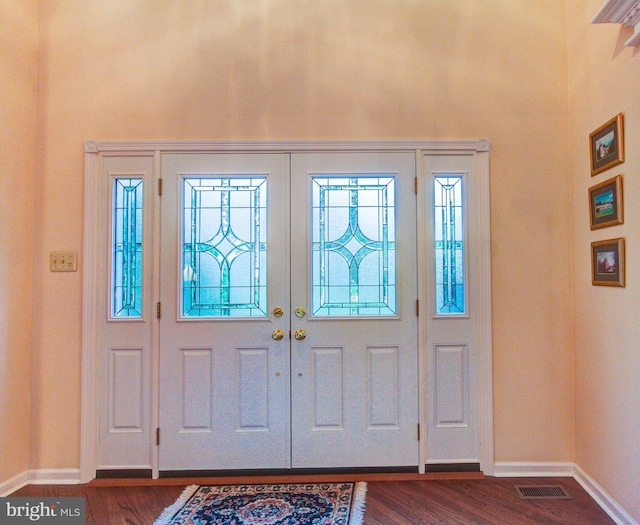 235 Amherst Dr, Doylestown, PA 18901 - entrance foyer featuring dark wood-type flooring, baseboards, and french doors