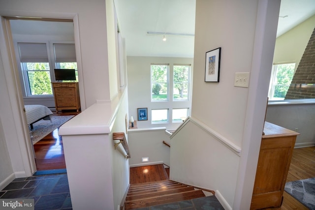 1272 Penfield Rd, State College, PA 16801 - staircase with plenty of natural light, rail lighting, baseboards, and a towering ceiling