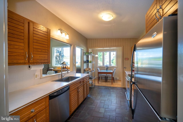 1272 Penfield Rd, State College, PA 16801 - kitchen with appliances with stainless steel finishes, a sink, and brown cabinets