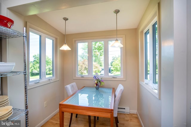 1272 Penfield Rd, State College, PA 16801 - dining room featuring baseboard heating, baseboards, and light wood finished floors
