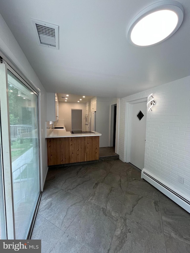 905 Dunellen Dr, Towson, MD 21286 - unfurnished living room with a baseboard heating unit