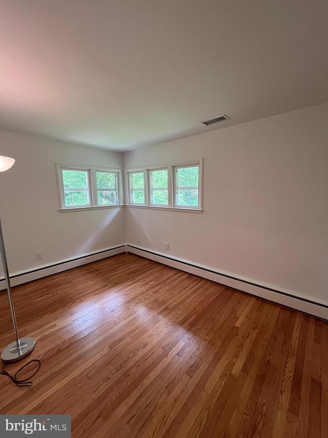 905 Dunellen Dr, Towson, MD 21286 - empty room featuring wood finished floors