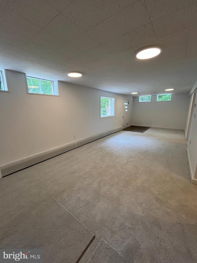 905 Dunellen Dr, Towson, MD 21286 - below grade area featuring healthy amount of natural light, carpet, and baseboards