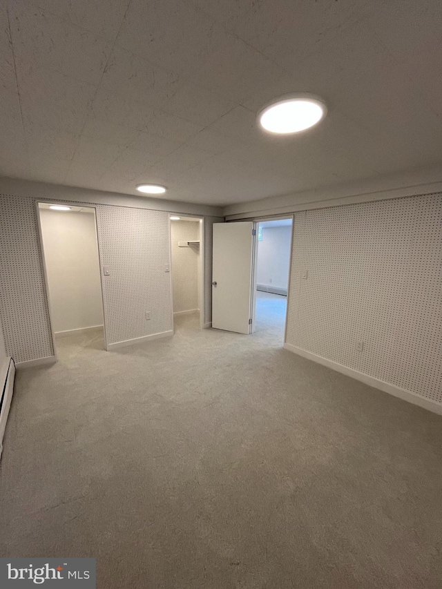 905 Dunellen Dr, Towson, MD 21286 - finished basement with light colored carpet and baseboards