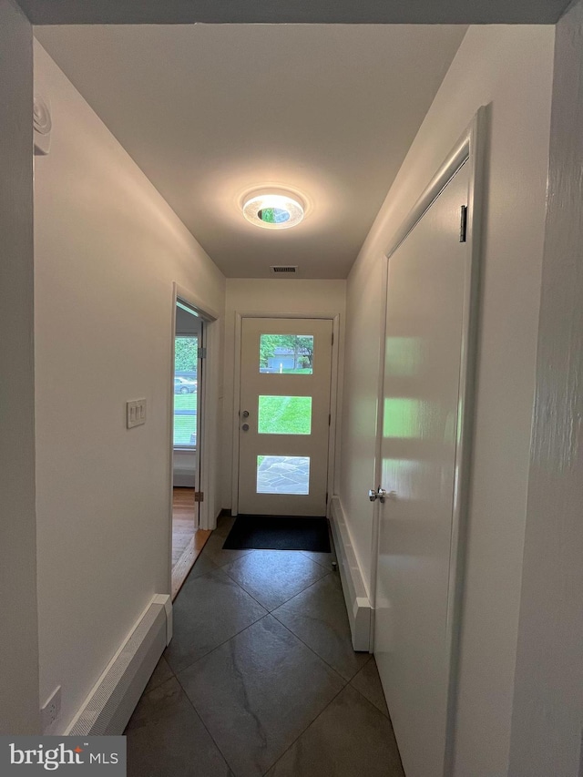 905 Dunellen Dr, Towson, MD 21286 - doorway to outside featuring baseboards
