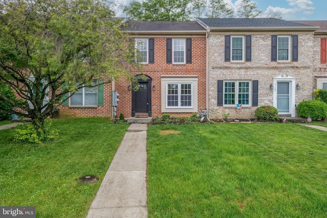 6127 Haymarket Way, Mechanicsburg, PA 17050 - multi unit property with a front yard and brick siding