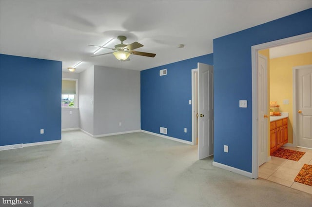4 Red Hawk Dr, Shippensburg, PA 17257 - unfurnished bedroom featuring light colored carpet, baseboards, a ceiling fan, and connected bathroom