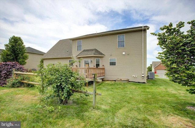 4 Red Hawk Dr, Shippensburg, PA 17257 - rear view of house with central AC, a deck, and a yard