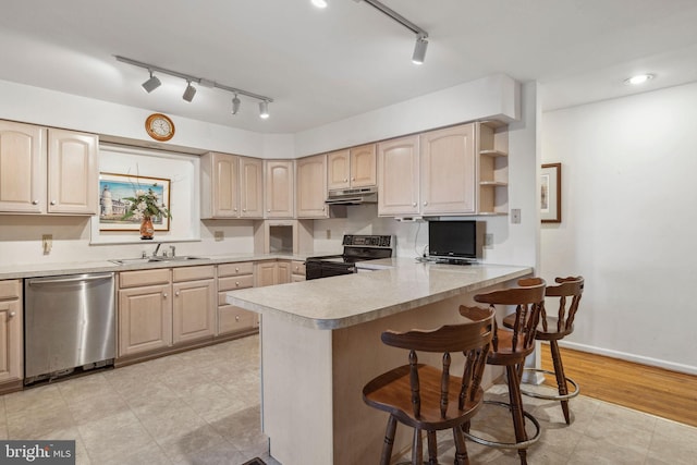 1316 Carpenters Point Rd, Perryville, MD 21903 - kitchen featuring stainless steel dishwasher, range with electric stovetop, a sink, and light brown cabinetry